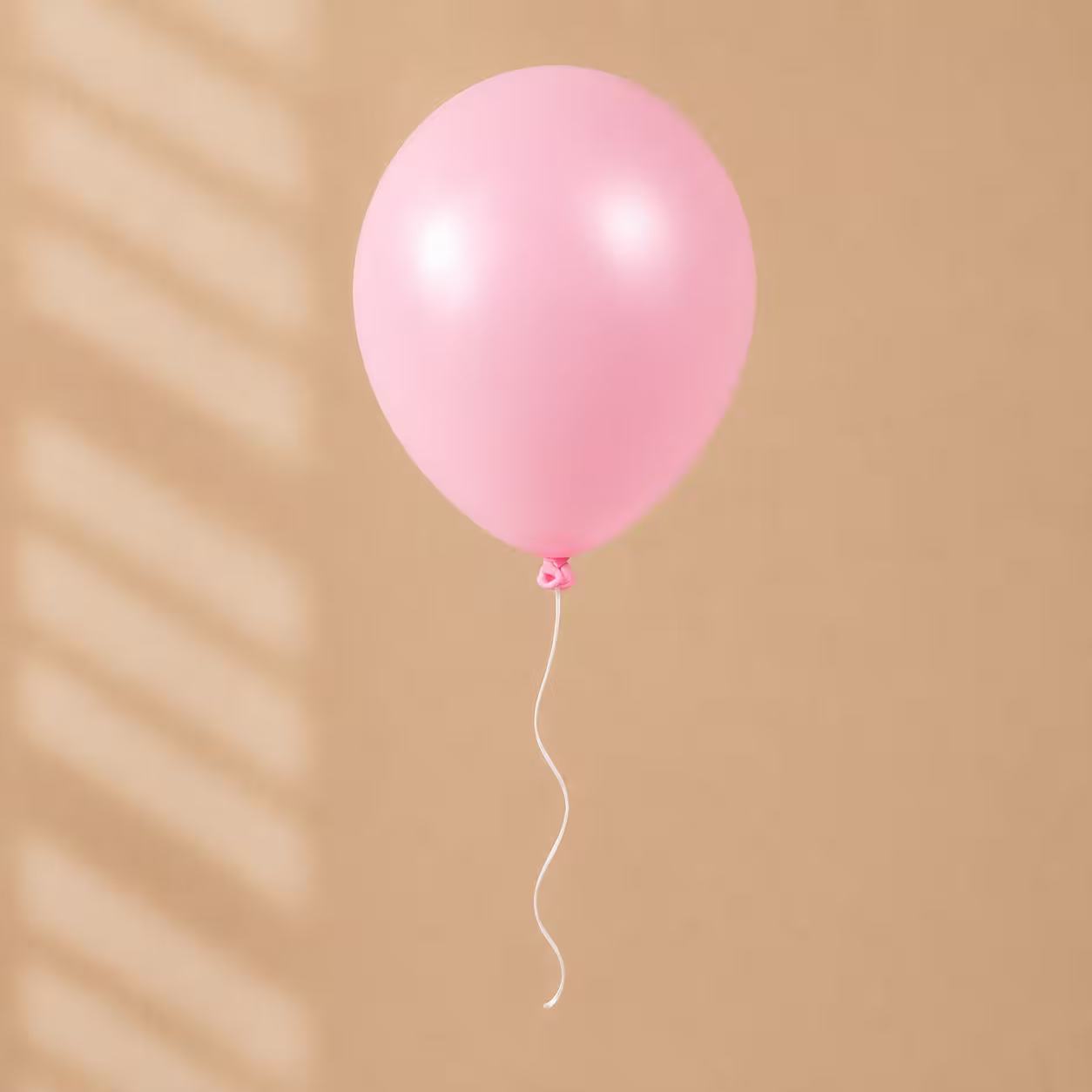 Balon umflat din latex roz